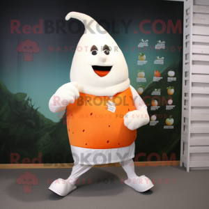 Cream Carrot mascot costume character dressed with a Running Shorts and Smartwatches