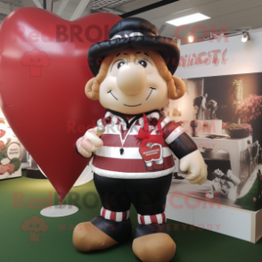 nan Heart Shaped Balloons mascot costume character dressed with a Rugby Shirt and Belts