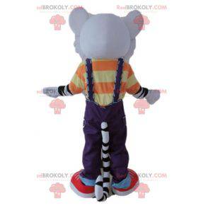 Mascotte tigre bianca e nera con un vestito colorato -
