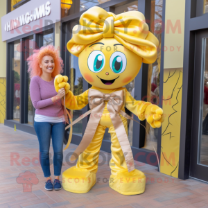 Gold Medusa mascot costume character dressed with a Mom Jeans and Bow ties