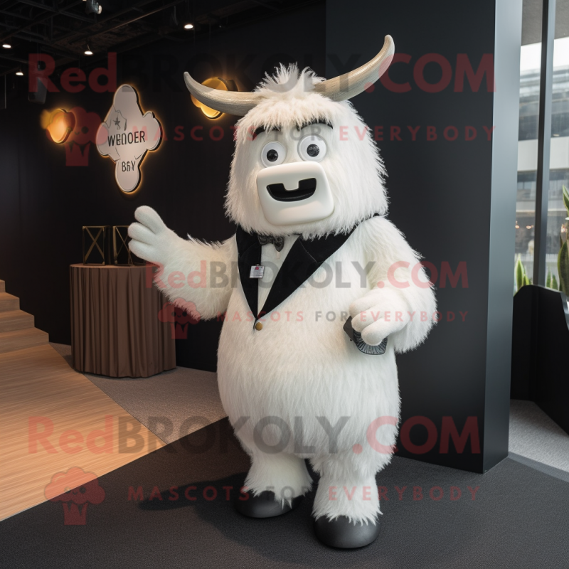 White Yak mascot costume character dressed with a Tuxedo and Clutch bags