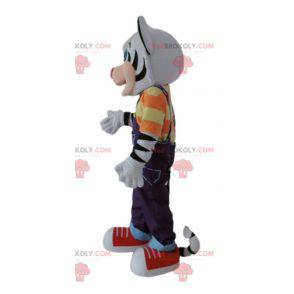 Mascotte tigre bianca e nera con un vestito colorato -