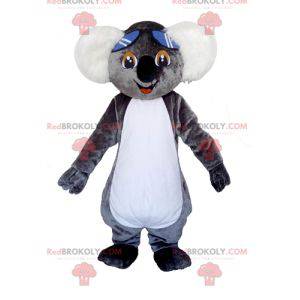 Very cute gray and white koala mascot with glasses -