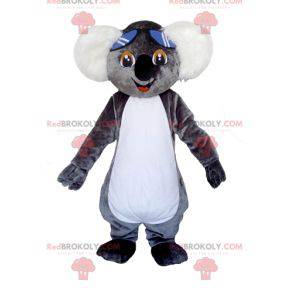 Mascote coala cinza e branco muito fofo com óculos -