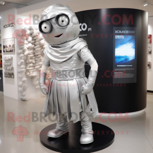 Silver Cyclops mascot costume character dressed with a Wrap Skirt and Belts