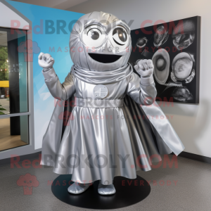 Silver Cyclops mascot costume character dressed with a Wrap Skirt and Belts