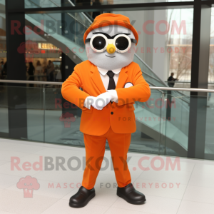 Orange Wrist Watch mascot costume character dressed with a Suit Jacket and Reading glasses