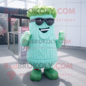 Cyan Corned Beef And Cabbage mascot costume character dressed with a Cardigan and Sunglasses