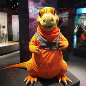 Orange Komodo Dragon mascot costume character dressed with a Wrap Skirt and Ties