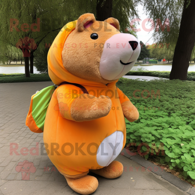 Peach Capybara mascot costume character dressed with a Jacket and Wraps Peach Capybara mascot costume character dressed with a Jacket and Wraps