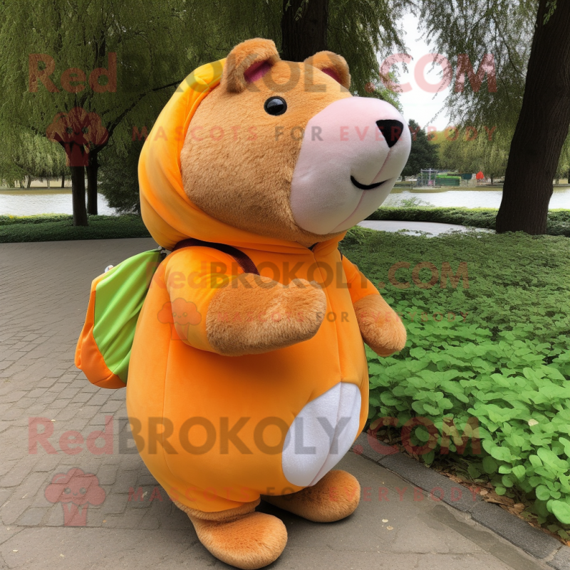 Peach Capybara mascot costume character dressed with a Jacket and Wraps