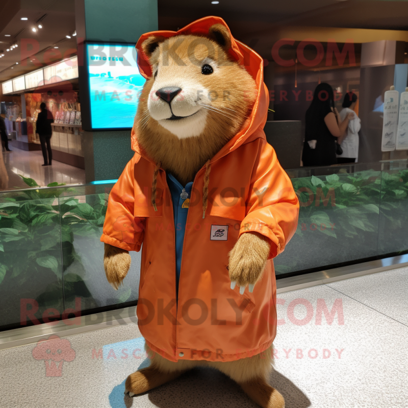Peach Capybara mascot costume character dressed with a Jacket and Wraps Peach Capybara mascot costume character dressed with a Jacket and Wraps