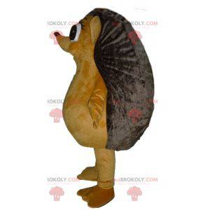 Mascote ouriço gigante e engraçado de bege e marrom -