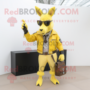 Lemon Yellow Donkey mascot costume character dressed with a Biker Jacket and Wallets