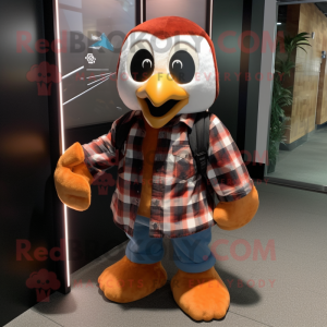 Rust Penguin mascot costume character dressed with a Flannel Shirt and Digital watches