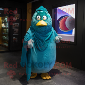 Teal Shakshuka mascot costume character dressed with a Coat and Wraps