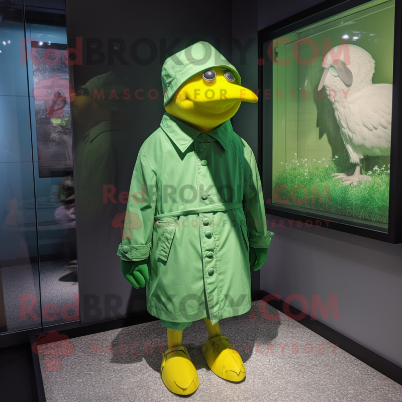 Green Canary mascot costume character dressed with a Raincoat and Shoe clips Green Canary mascot costume character dressed with a Raincoat and Shoe clips