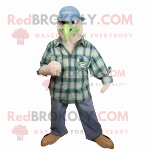 Green Bald Eagle mascot costume character dressed with a Chambray Shirt and Hat pins