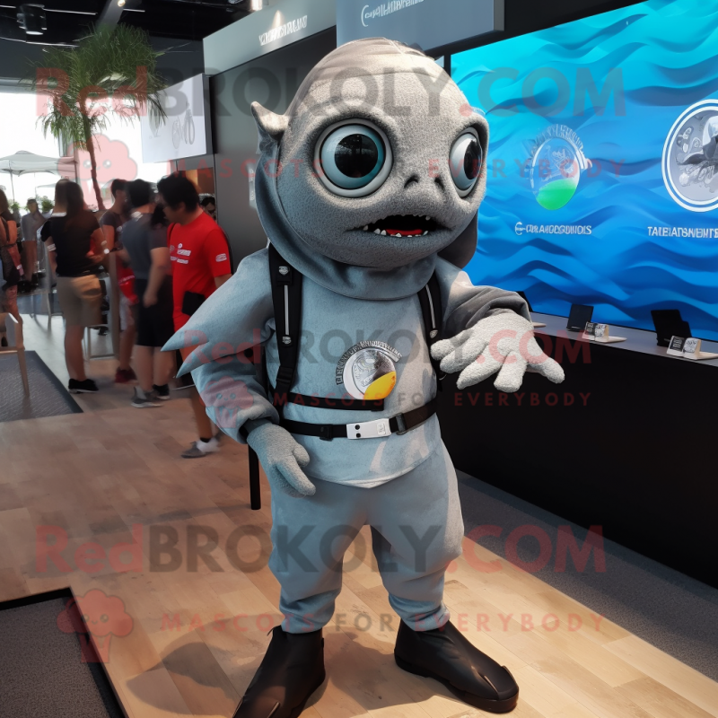 Gray Ceviche mascot costume character dressed with a Graphic Tee and Digital watches Gray Ceviche mascot costume character dressed with a Graphic Tee and Digital watches