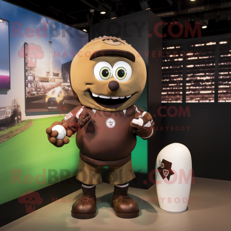 Brown Grenade mascot costume character dressed with a Rugby Shirt and Cufflinks