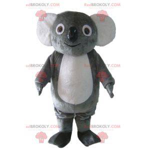 Mascota de koala gris y blanco regordeta suave y divertida -