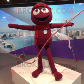 Maroon Tightrope Walker mascot costume character dressed with a Skinny Jeans and Shawl pins