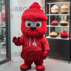 Red Cupcake mascot costume character dressed with a T-Shirt and Beanies