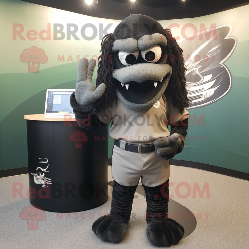 Black Snake mascot costume character dressed with a Baseball Tee and Hair clips Black Snake mascot costume character dressed with a Baseball Tee and Hair clips