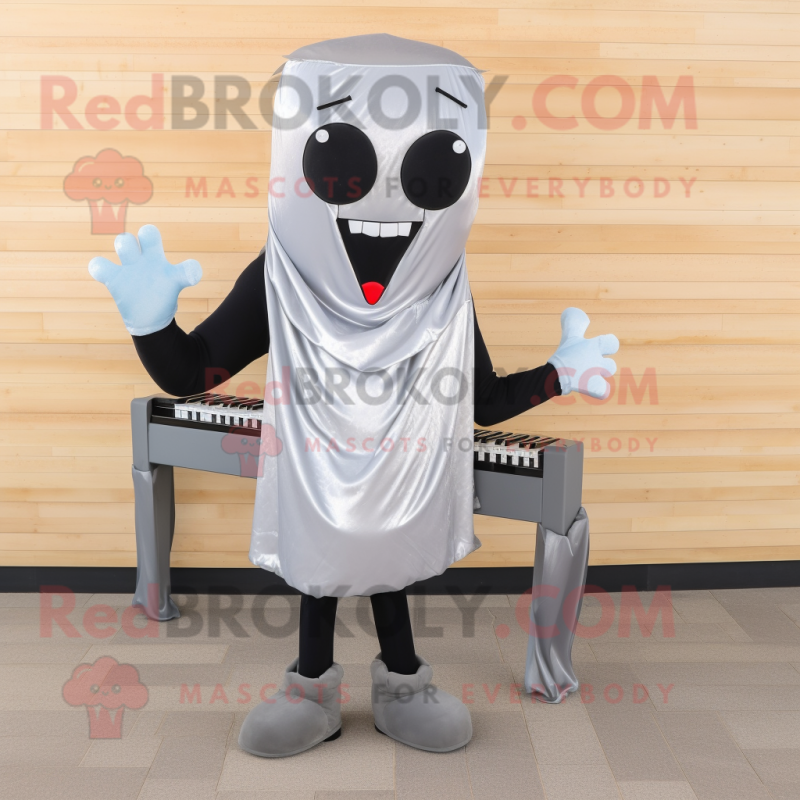 Silver Steak mascot costume character dressed with a Leggings and Scarf clips