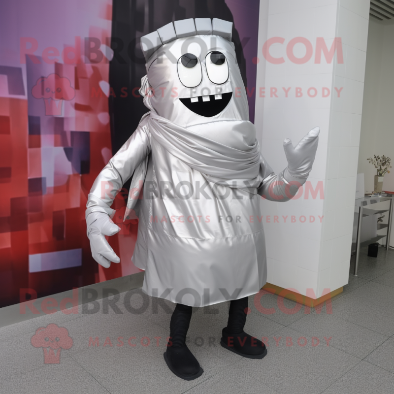 Silver Steak mascot costume character dressed with a Leggings and Scarf clips