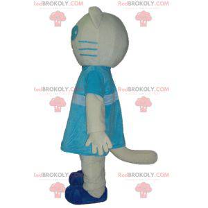 Weißes und blaues Katzenmaskottchen mit einem blauen Kleid -