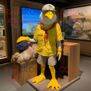 Yellow Gull mascot costume character dressed with a Cargo Shorts and Headbands
