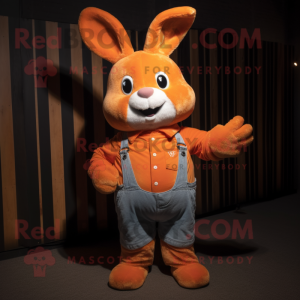 Orange Rabbit mascot costume character dressed with a Flare Jeans and Tie pins