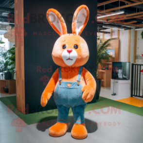 Orange Rabbit mascot costume character dressed with a Flare Jeans and Tie pins