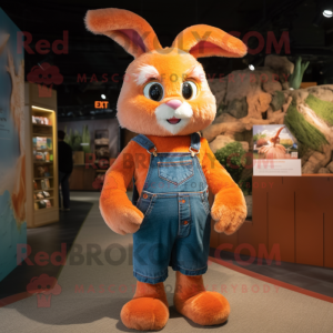 Orange Rabbit mascot costume character dressed with a Flare Jeans and Tie pins