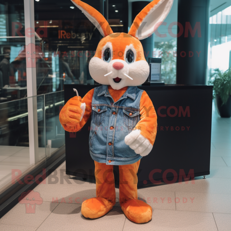 Orange Rabbit mascot costume character dressed with a Flare Jeans and Tie pins Orange Rabbit mascot costume character dressed with a Flare Jeans and Tie pins