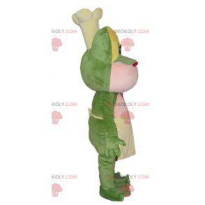 Geel en roze groene kikker mascotte met een koksmuts -