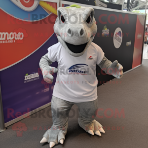 Silver Iguanodon mascot costume character dressed with a Running Shorts and Headbands