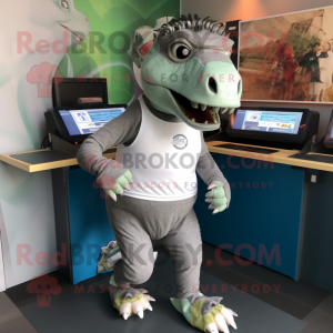 Silver Iguanodon mascot costume character dressed with a Running Shorts and Headbands