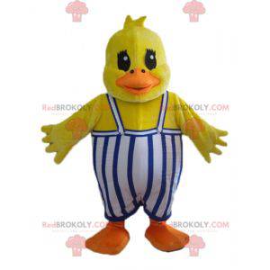 Mascotte de poussin de canard jaune avec une salopette -