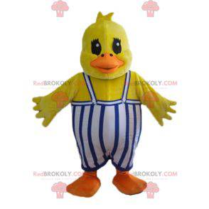 Mascotte de poussin de canard jaune avec une salopette -