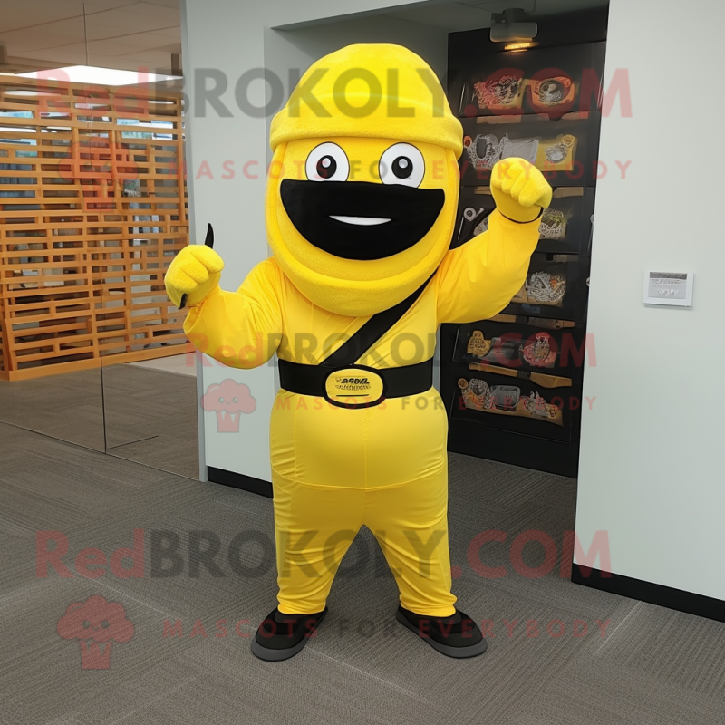 Yellow Ninja mascot costume character dressed with a A-Line Skirt and Hat pins