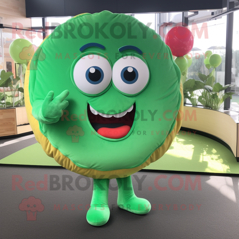 Green Donut mascot costume character dressed with a Flare Jeans and Clutch bags