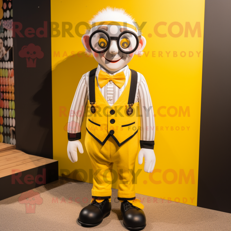 Yellow Mime mascot costume character dressed with a Waistcoat and Eyeglasses