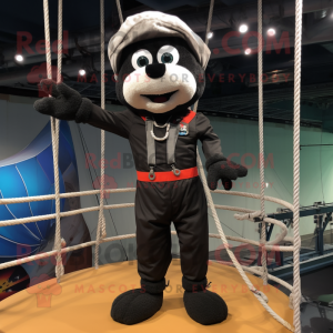 Black Tightrope Walker mascot costume character dressed with a Cargo Pants and Rings