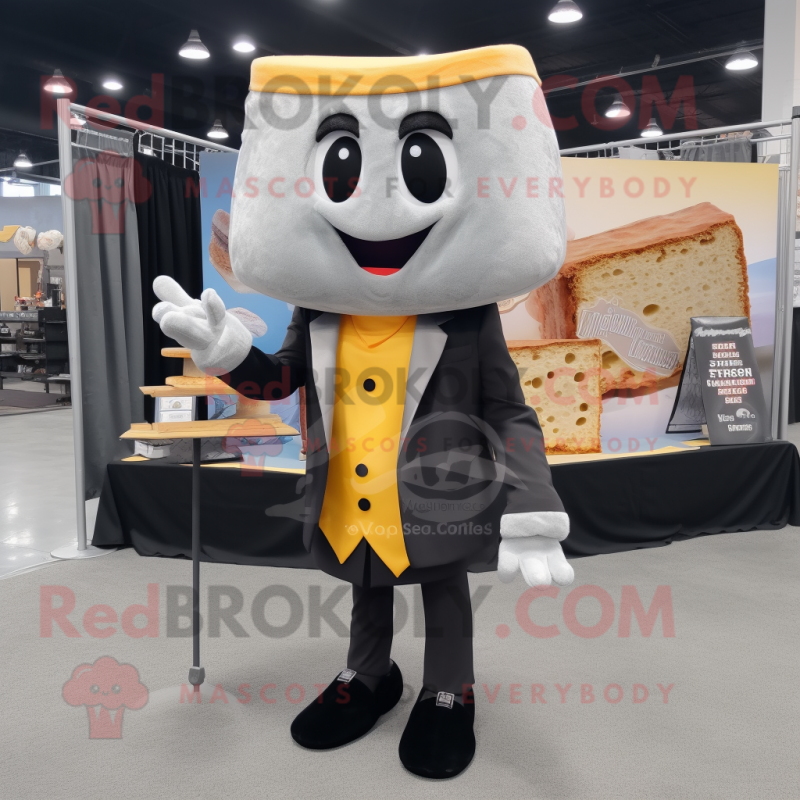 Gray Grilled Cheese Sandwich mascot costume character dressed with a Tuxedo and Shawl pins Gray Grilled Cheese Sandwich mascot costume character dressed with a Tuxedo and Shawl pins