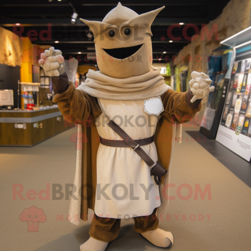 Tan Medieval Knight mascot costume character dressed with a Corduroy Pants and Shawl pins