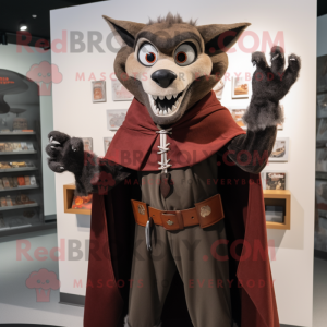 Brown Vampire mascot costume character dressed with a Coat and Belts