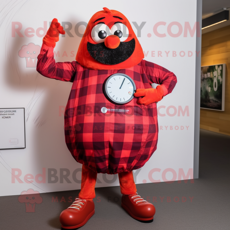 Red Shakshuka mascot costume character dressed with a Flannel Shirt and Smartwatches Red Shakshuka mascot costume character dressed with a Flannel Shirt and Smartwatches