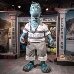 Silver Loch Ness Monster mascot costume character dressed with a Rugby Shirt and Suspenders